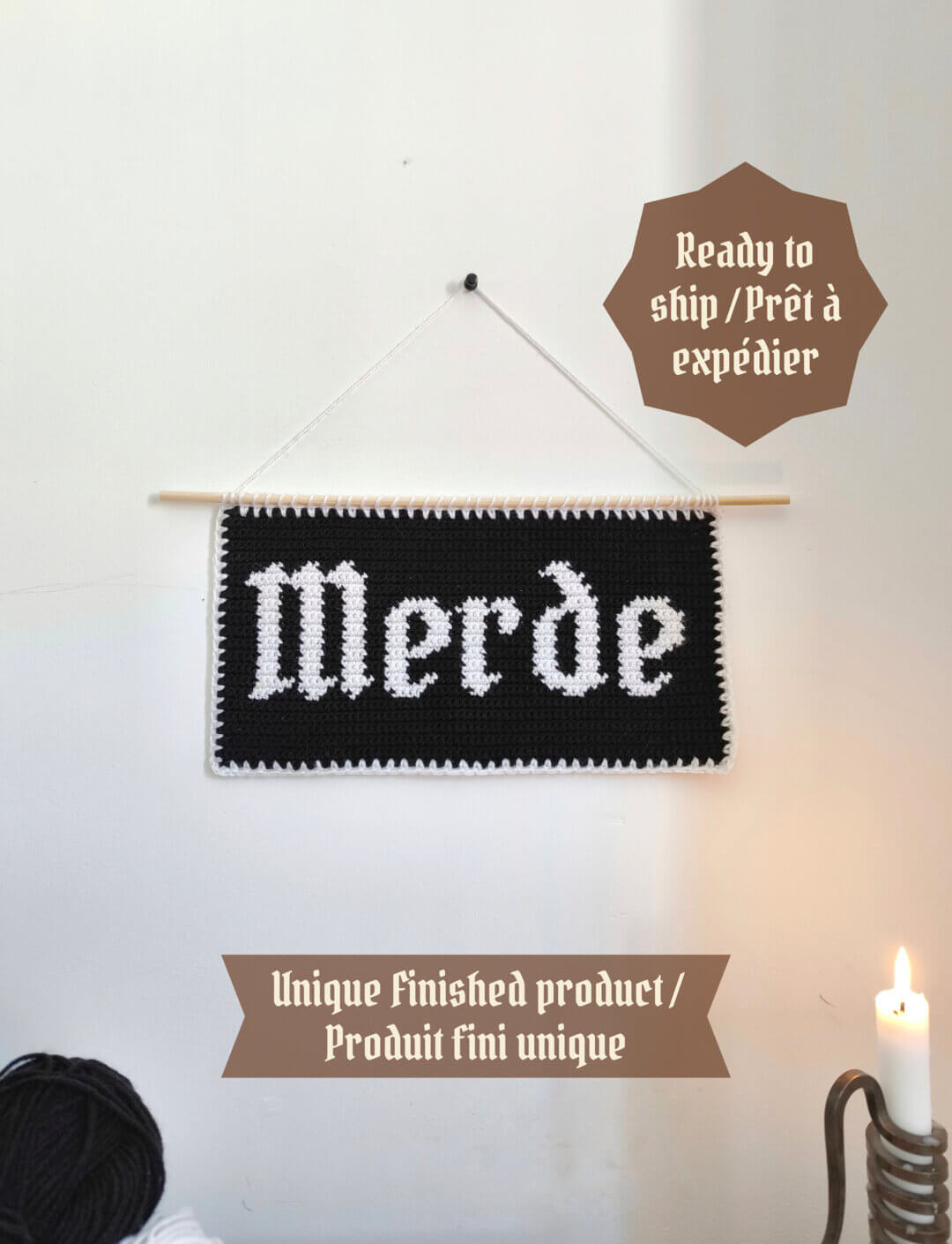 tapisserie "merde" à suspendre